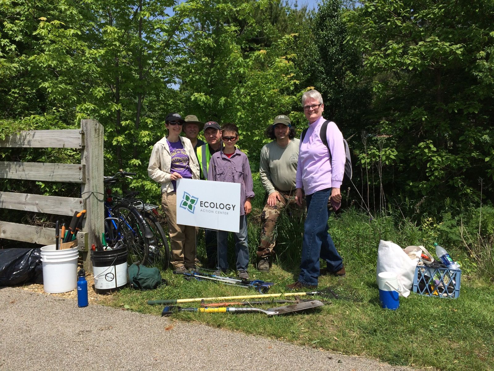 sugar creek stewards volunteers posing with tools