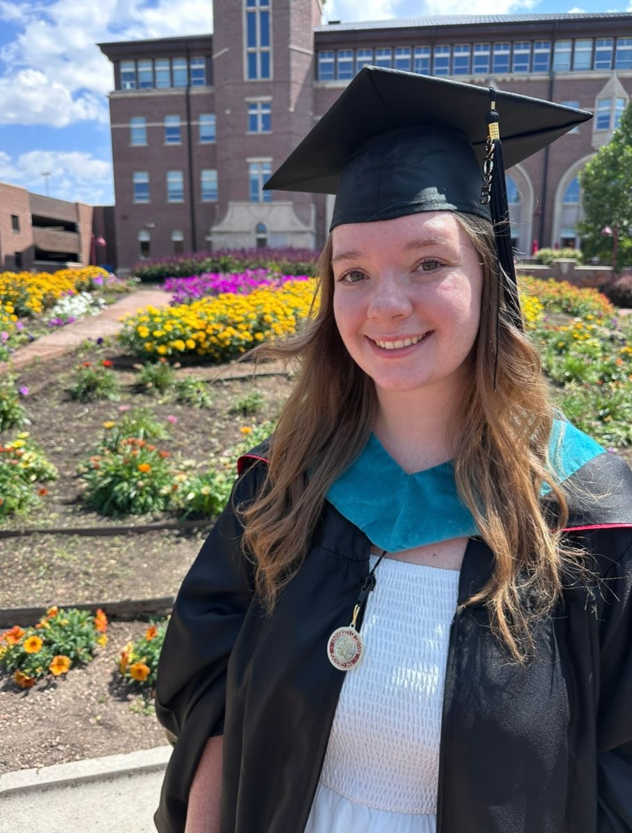 Hadley McKenzie in graduation cap and gown