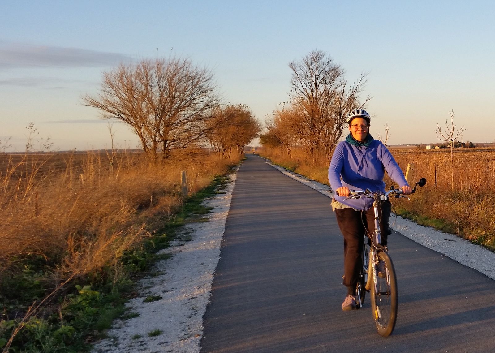 Kari bicycling the trail